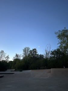Crescent moon over skatepark.